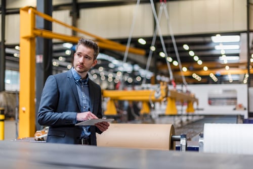 businessman-using-tablet-on-factory-shop-floor-2022-12-16-22-35-56-utc businessman-using-tablet-on-factory-shop-floor-2022-12-16-22-35-56-utc